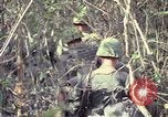 Image of United States soldiers on patrol in Vietnam War Vietnam, 1967, second 44 stock footage video 65675027034