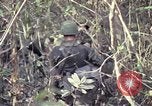 Image of United States soldiers on patrol in Vietnam War Vietnam, 1967, second 48 stock footage video 65675027034