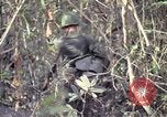 Image of United States soldiers on patrol in Vietnam War Vietnam, 1967, second 51 stock footage video 65675027034
