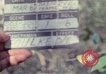Image of United States soldiers on patrol in Vietnam War Vietnam, 1967, second 62 stock footage video 65675027034