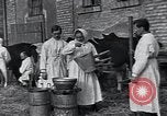 Image of American Friends Service Committee providing milk to children Europe, 1923, second 38 stock footage video 65675027113
