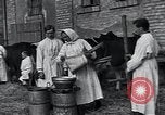 Image of American Friends Service Committee providing milk to children Europe, 1923, second 39 stock footage video 65675027113