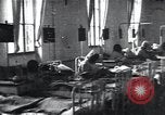 Image of Patients in hospital tended by nuns Vienna Austria, 1923, second 1 stock footage video 65675027115