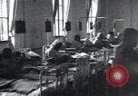 Image of Patients in hospital tended by nuns Vienna Austria, 1923, second 4 stock footage video 65675027115