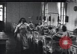 Image of Patients in hospital tended by nuns Vienna Austria, 1923, second 25 stock footage video 65675027115