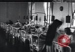 Image of Patients in hospital tended by nuns Vienna Austria, 1923, second 27 stock footage video 65675027115