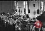 Image of Patients in hospital tended by nuns Vienna Austria, 1923, second 28 stock footage video 65675027115