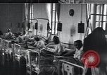 Image of Patients in hospital tended by nuns Vienna Austria, 1923, second 29 stock footage video 65675027115