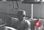 Image of Patients in hospital tended by nuns Vienna Austria, 1923, second 34 stock footage video 65675027115