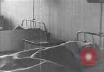 Image of Patients in hospital tended by nuns Vienna Austria, 1923, second 58 stock footage video 65675027115
