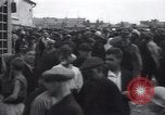 Image of crowded market street Russia, 1937, second 8 stock footage video 65675027138