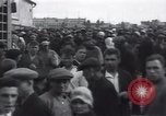 Image of crowded market street Russia, 1937, second 9 stock footage video 65675027138