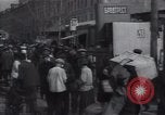 Image of crowded market street Russia, 1937, second 17 stock footage video 65675027138
