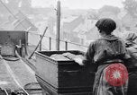 Image of British women employed in a factory United Kingdom, 1915, second 16 stock footage video 65675027184