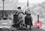 Image of British women employed in a factory United Kingdom, 1915, second 18 stock footage video 65675027184