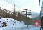 Image of Passenger train in snowy mountains United States USA, 1985, second 3 stock footage video 65675027198