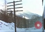 Image of Passenger train in snowy mountains United States USA, 1985, second 4 stock footage video 65675027198