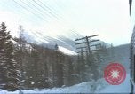 Image of Passenger train in snowy mountains United States USA, 1985, second 5 stock footage video 65675027198