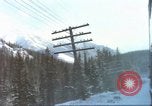 Image of Passenger train in snowy mountains United States USA, 1985, second 6 stock footage video 65675027198