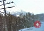 Image of Passenger train in snowy mountains United States USA, 1985, second 7 stock footage video 65675027198