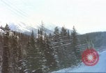 Image of Passenger train in snowy mountains United States USA, 1985, second 8 stock footage video 65675027198