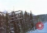 Image of Passenger train in snowy mountains United States USA, 1985, second 9 stock footage video 65675027198
