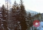 Image of Passenger train in snowy mountains United States USA, 1985, second 13 stock footage video 65675027198