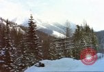 Image of Passenger train in snowy mountains United States USA, 1985, second 16 stock footage video 65675027198