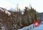 Image of Passenger train in snowy mountains United States USA, 1985, second 18 stock footage video 65675027198