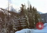 Image of Passenger train in snowy mountains United States USA, 1985, second 19 stock footage video 65675027198
