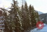 Image of Passenger train in snowy mountains United States USA, 1985, second 20 stock footage video 65675027198