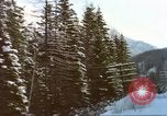 Image of Passenger train in snowy mountains United States USA, 1985, second 21 stock footage video 65675027198