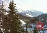 Image of Passenger train in snowy mountains United States USA, 1985, second 24 stock footage video 65675027198