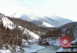 Image of Passenger train in snowy mountains United States USA, 1985, second 27 stock footage video 65675027198