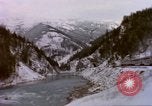 Image of Passenger train in snowy mountains United States USA, 1985, second 32 stock footage video 65675027198