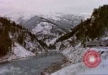 Image of Passenger train in snowy mountains United States USA, 1985, second 33 stock footage video 65675027198