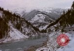 Image of Passenger train in snowy mountains United States USA, 1985, second 35 stock footage video 65675027198