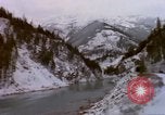 Image of Passenger train in snowy mountains United States USA, 1985, second 37 stock footage video 65675027198