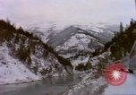 Image of Passenger train in snowy mountains United States USA, 1985, second 38 stock footage video 65675027198