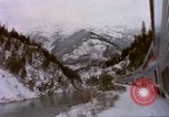 Image of Passenger train in snowy mountains United States USA, 1985, second 39 stock footage video 65675027198