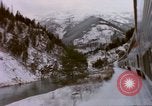 Image of Passenger train in snowy mountains United States USA, 1985, second 41 stock footage video 65675027198