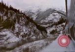 Image of Passenger train in snowy mountains United States USA, 1985, second 42 stock footage video 65675027198