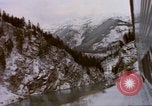 Image of Passenger train in snowy mountains United States USA, 1985, second 46 stock footage video 65675027198
