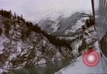 Image of Passenger train in snowy mountains United States USA, 1985, second 47 stock footage video 65675027198
