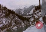 Image of Passenger train in snowy mountains United States USA, 1985, second 48 stock footage video 65675027198