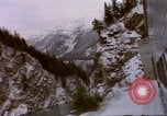 Image of Passenger train in snowy mountains United States USA, 1985, second 50 stock footage video 65675027198