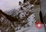 Image of Passenger train in snowy mountains United States USA, 1985, second 51 stock footage video 65675027198