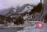 Image of Passenger train in snowy mountains United States USA, 1985, second 58 stock footage video 65675027198