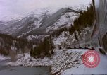 Image of Passenger train in snowy mountains United States USA, 1985, second 59 stock footage video 65675027198
