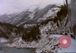 Image of Passenger train in snowy mountains United States USA, 1985, second 60 stock footage video 65675027198